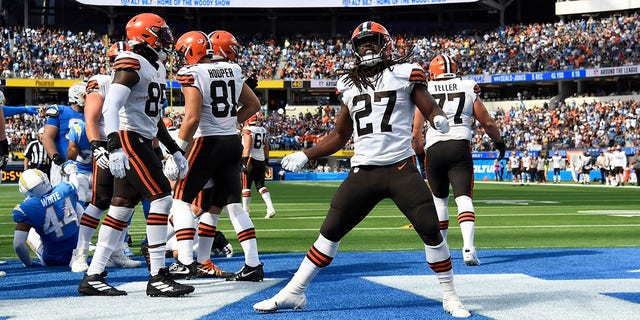 Cleveland Browns running back Kareem Hunt, #27, celebrates his rushing touchdown during the first half of an NFL football game against the Los Angeles Chargers Sunday, Oct. 10, 2021, in Inglewood, Calif. 