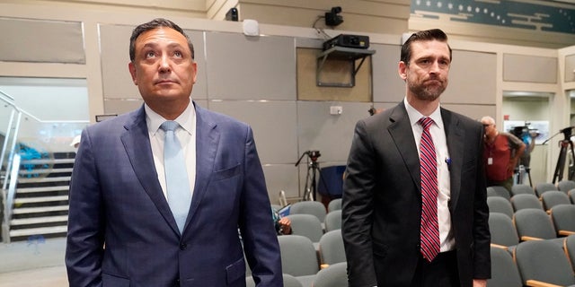 Miami Police Chief Art Acevedo and his attorney John R. Byrne arrive at Miami City Hall on Thursday for a hearing to determine his work.  Acevedo was suspended after a turbulent six-month term and resigned on Thursday. 