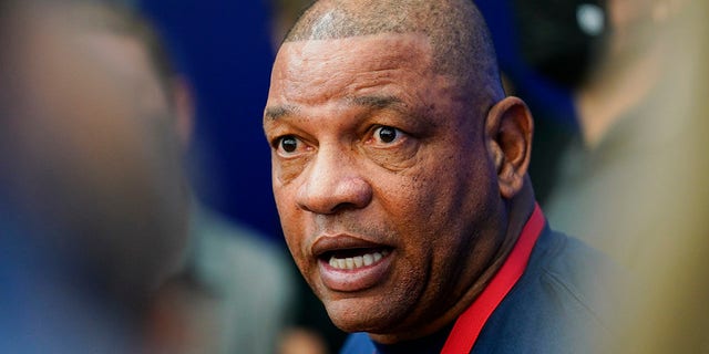 Philadelphia 76ers head coach Doc Rivers speak with members of the media after a practice at the NBA basketball team's facility, Tuesday, Oct. 19, 2021, in Camden, New Jersey. (AP Photo/Matt Rourke)