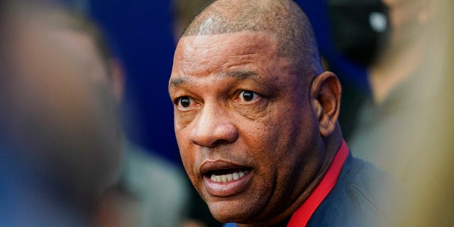 Philadelphia 76ers head coach Doc Rivers speak with members of the media after a practice at the NBA basketball team's facility, Tuesday, Oct. 19, 2021, in Camden, New Jersey. (AP Photo/Matt Rourke)