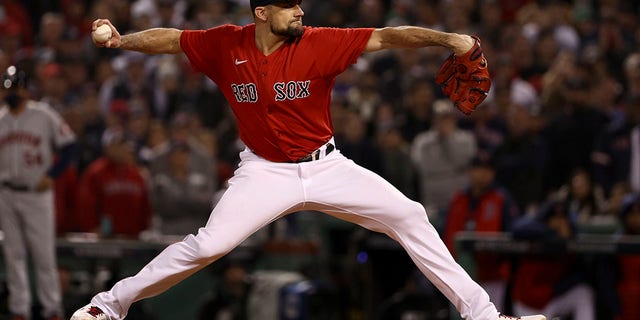 Boston Red Sox starting pitcher Nathan Eovaldi throws against the Houston Astros during the ninth inning of Game 4 of the American League Championship Series Oct. 19, 2021, in Boston.