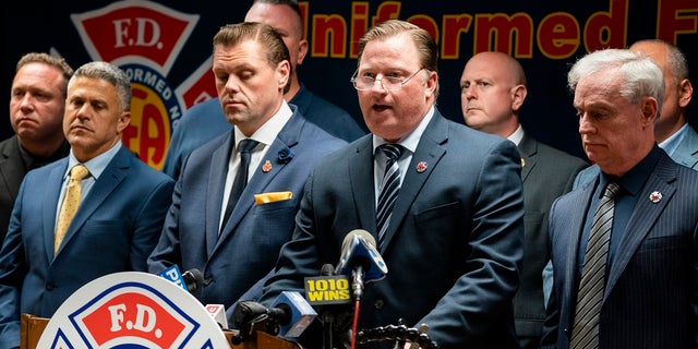 Andrew Ansbro, FDNY Uniformed Firefighters Association President, speaks during a news conference to address a newly announced COVID-19 vaccine mandate on Wednesday in New York. (AP Photo/John Minchillo)