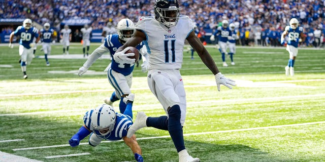 Tennessee Titans wide receiver A.J. Brown (11) runs to the end zone for a touchdown against the Indianapolis Colts in the first half in Indianapolis Sunday, Oct. 31, 2021.