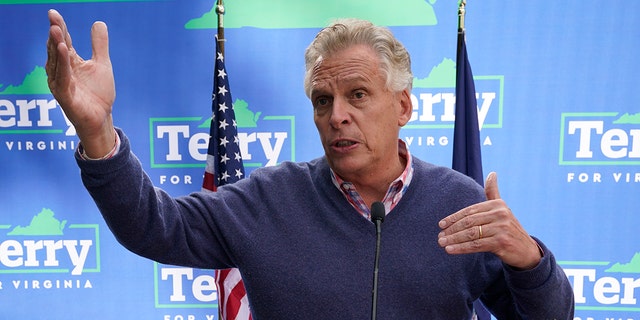 Democratic gubernatorial candidate, former Virginia Gov. Terry McAuliffe speaks to supporters during a rally in Richmond, Virginia, Sunday, Oct. 31, 2021.