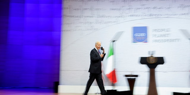 U.S. President Joe Biden arrives for a press conference at the La Nuvola conference center for the G20 summit in Rome, Sunday, Oct. 31, 2021. Leaders of the world's biggest economies made a compromise commitment Sunday to reach carbon neutrality 