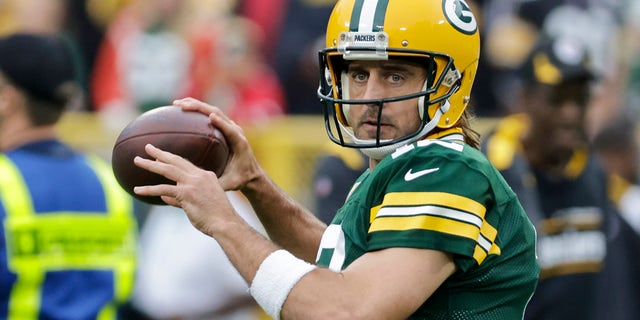 Aaron Rodgers of the Green Bay Packers warms up before a game against the Pittsburgh Steelers on Sunday October 3, 2021 in Green Bay, Wisconsin.