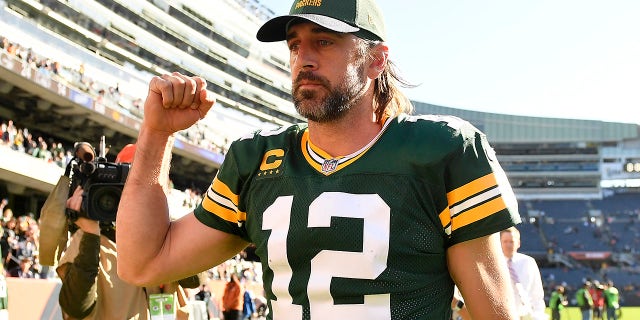 Aaron Rodgers #12 of the Green Bay Packers celebrating after the Packers defeated the Chicago Bears 24-14 at Soldier Field on Oct. 17 in Chicago.