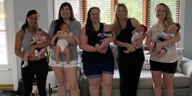 From left: Nurse Rosa Brito and her son Zayan, Nurse Freida Etscheid and her daughter Aurora, Nurse Angelica Prisk and her son Wyatt, Nurse Ashley Becht and her daughter Lainey, and Nurse Christina Imer and her son Benjamin.