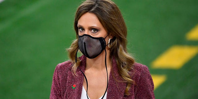 ESPN side line reporter Allison Williams walks on the field during the College Football Playoff Semifinal at the Rose Bowl football game between the Alabama Crimson Tide and the Notre Dame Fighting Irish at AT&T Stadium on January 01, 2021 in Arlington, Texas.