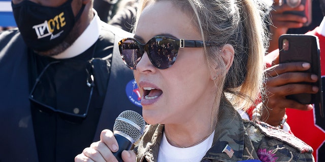 Actress and People For the American Way board member Alyssa Milano speaks at the