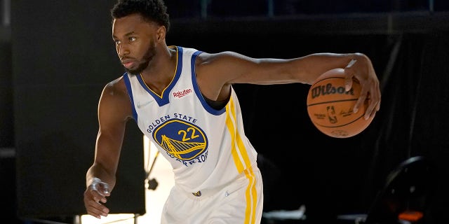 Golden State Warriors forward Andrew Wiggins poses for photos during NBA Basketball Team Media Day in San Francisco on Monday, September 27, 2021.