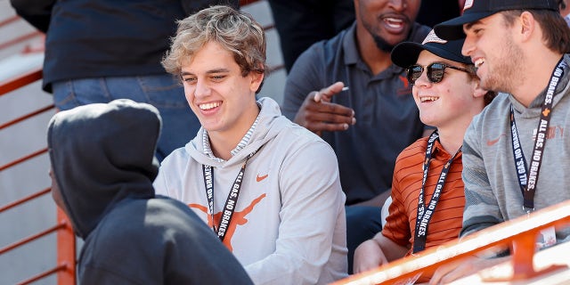 Arch Manning of Isidore Newman School attends the game between the Texas Longhorns and the Oklahoma State Cowboys at Darrell K Royal-Texas Memorial Stadium on October 16, 2021 in Austin, Texas.