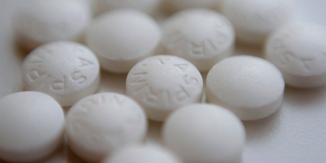 This Aug. 23, 2018 file photo shows an arrangement of aspirin pills in New York. (AP Photo/Patrick Sison, File)