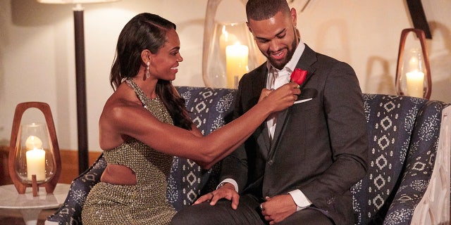 Michelle presented her coveted first impression rose to Nayte Olukoya.