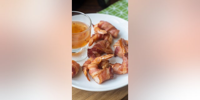 Need a last-minute appetizer for game day? This bacon-wrapped shrimp is a top contender.