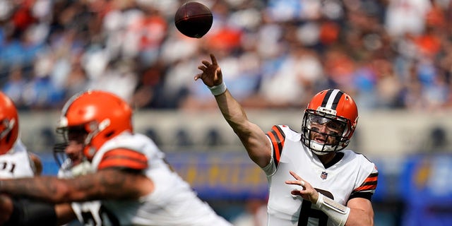 Cleveland Browns quarterback Baker Mayfield throws during the first half of an NFL football game against the Los Angeles Chargers Sunday, Oct. 10, 2021, in Inglewood, Calif.