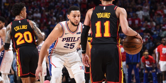 PHILADELPHIA, PA - JUNE 20: Ben Simmons #25 of the Philadelphia 76ers plays defense against Trae Young #11 of the Atlanta Hawks during Round 2, Game 7 of the Eastern Conference Playoffs on June 20, 2021 at Wells Fargo Center in Philadelphia, Pennsylvania. 