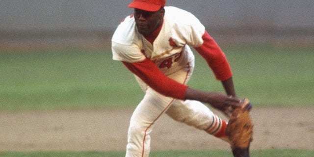 St. Louis Cardinals' Bob Gibson #45 pitches against the Boston Red Sox during the 1967 World Series at Busch Stadium in St. Louis, Missouri, in October 1967.