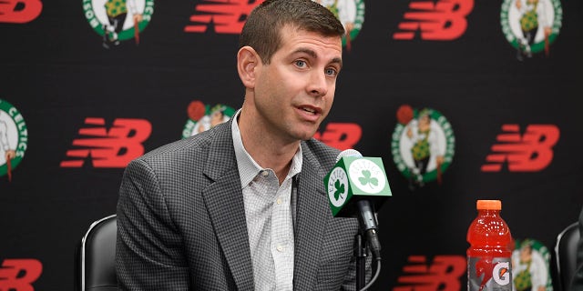 President Brad Stevens of the Boston Celtics introduces Ime Udoka as the team's new head coach during a press conference June 28, 2021 at the TD Garden in Boston.
