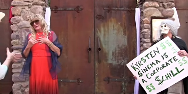 An Arizona bride and her mother pleaded with protesters outside a wedding that Sen. Kyrsten Sinema, D-Arizona, officiated over the weekend to stop disrupting the event, according to a video from demonstrators. (Credit: "Lone protester" screenshot from YouTube video)