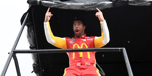 NASCAR Cup Series driver Bubba Wallace (23) celebrates after he was announced the winner of the YellaWood 500 at Talladega Superspeedway.