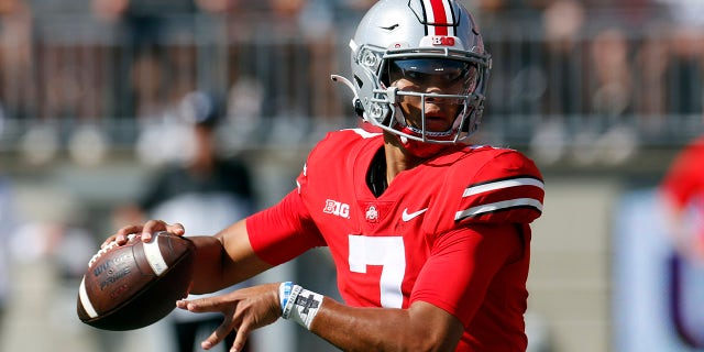 Ohio State quarterback C.J. Stroud drops back to pass against Maryland during the first half of an NCAA college football game Saturday, Oct. 9, 2021, in Columbus, Ohio.