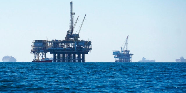 Oil platforms are pictured in 2021 off the coast of California.