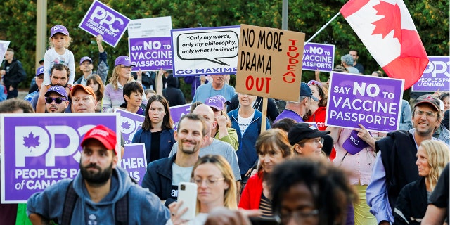 People's Party of Canada (PPC) supporters protest after leader Maxime Bernier was not invited to the two federal election debates held at the Canadian Museum of History in Gatineau, Quebec, September 9, 2021. REUTERS/Patrick Doyle