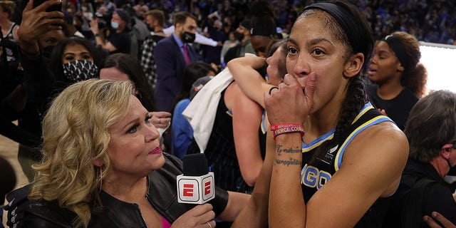 Candace Parker #3 of the Chicago Sky speaks with ESPN reporter Holly Rowe following Game Four of the WNBA Finals at Wintrust Arena on October 17, 2021 in Chicago, Illinois. The Chicago Sky defeated the Phoenix Mercury 80-74 to win the championship.