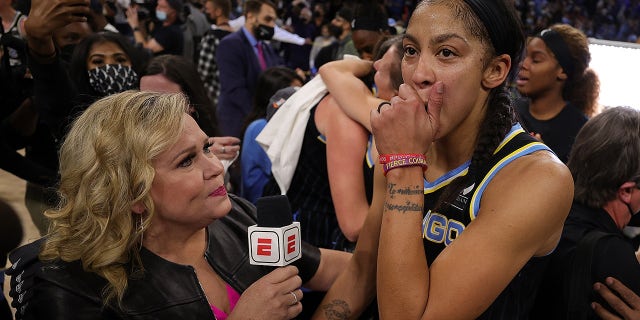 Candace Parker #3 of the Chicago Sky speaks with ESPN reporter Holly Rowe following Game Four of the WNBA Finals at Wintrust Arena on October 17, 2021 in Chicago, Illinois. The Chicago Sky defeated the Phoenix Mercury 80-74 to win the championship.