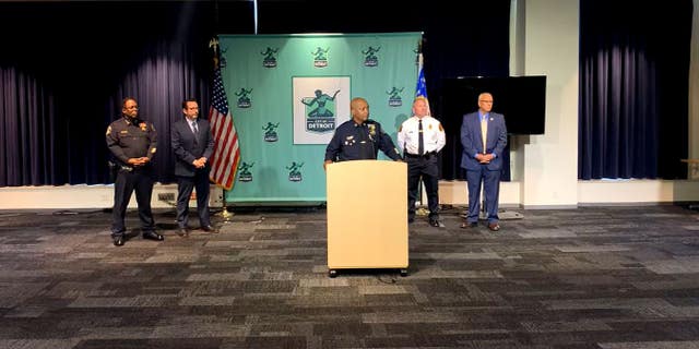 Detroit Police Chief James White and Farmington Hills Police Chief Jeff King speak about a case during a news conference