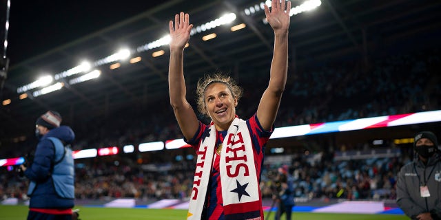U.S. forward Carli Lloyd waves to fans after a soccer friendly match against South Korea, in St. Paul, Minnesota, Oct. 26, 2021.