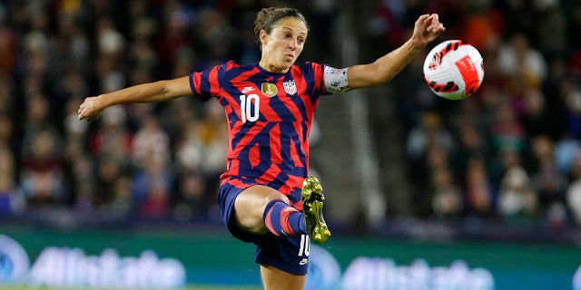 U.S. forward Carli Lloyd tries to stop the ball against South Korea in the first half of a soccer friendly match Oct. 26, 2021, in St. Paul, Minnesota.