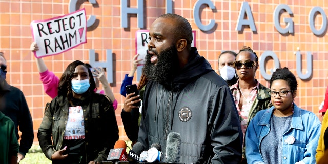 Community activist Will Calloway speaks at a rally outside Chicago Police Headquarters on Tuesday, October 19, 2021 in Chicago. Calloway is among campaigners calling on the Senate to reject Rahm Emanuel's appointment as President Joe Biden's ambassador to Japan. (AP Photo / Teresa Crawford)