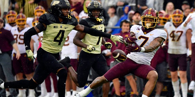 Minnesota Golden Gophers wide receiver Chris Autman-Bell (7) misses a pass in front of Purdue Boilermakers safety Marvin Grant (4) during the second quarter at Ross-Ade Stadium.