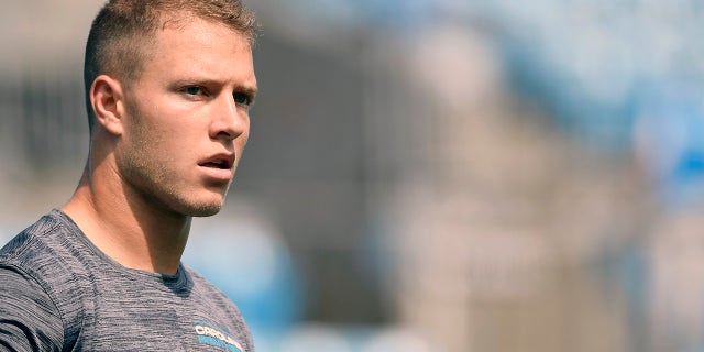 CHARLOTTE, NORTH CAROLINA - SEPTEMBER 19: Running Back Christian McCaffrey #22 of the Carolina Panthers during pregame waRm-ups in the game against the New Orleans Saints at Bank of America Stadium on September 19, 2021 in Charlotte, North Carolina.