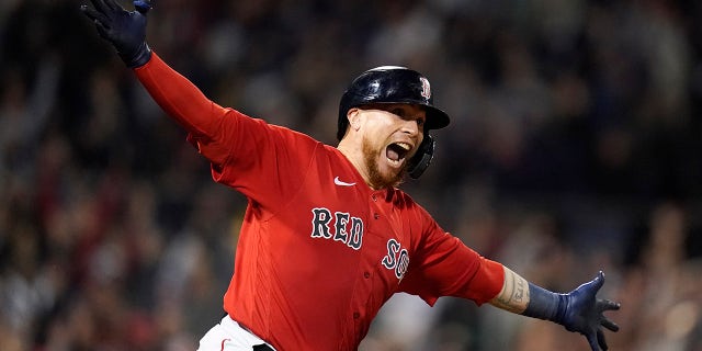 Boston Red Sox Christian Vazquez reacts after hitting a home run against the Tampa Bay Rays in the thirteenth inning in Game 3 of an American League Baseball Division Series on Sunday, October 10, 2021, at Boston.  The Red Sox won 6-4.