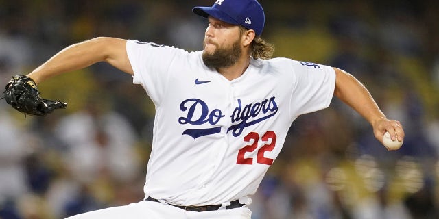 Los Angeles Dodgers starting pitcher Clayton Kershaw (22) throws during the first inning of a baseball game Friday, Oct. 1, 2021, in Los Angeles.