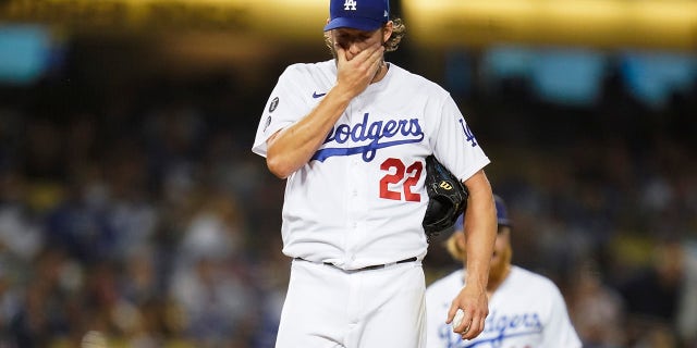 Los Angeles Dodgers starting pitcher Clayton Kershaw (22) reacts on the mound before he exits the game during the second inning of a baseball game against the Milwaukee Brewers Friday, Oct. 1, 2021, in Los Angeles.