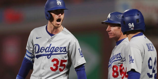 Los Angeles Dodgers' Cody Bellinger (35) reacts after hitting an RBI-single against the San Francisco Giants during the ninth inning of Game 5 of a baseball National League Division Series Thursday, Oct. 14, 2021, in San Francisco.