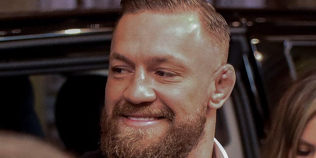 Conor McGregor and his wife Dee Devlin are seen on October 15 2021 in Rome, Italy.