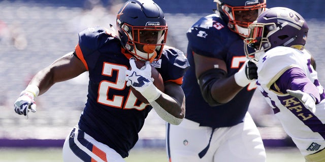 D'Ernest Johnson (22) of the Orlando Apollos runs with the ball during the first half against the Atlanta Legends in an Alliance of American Football game at Georgia State Stadium on March 23, 2019, in Atlanta, Georgia.