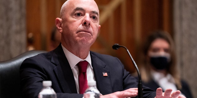 U.S. Secretary of Homeland Security Alejandro Mayorkas gestures as he answers a question during a Senate Homeland Security and Governmental Affairs hearing to discuss security threats 20 years after the 9/11 attacks, in Washington, D.C., September 21, 2021.