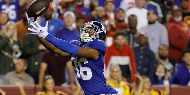 New York Giants wide receiver Darius Slayton attempts to catch a touchdown pass against the Washington Football Team in the fourth quarter at FedExField