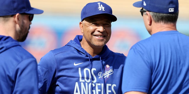 Los Angeles Dodgers manager Dave Roberts # 30 looks on before the game between the St. Louis Cardinals and the Los Angeles Dodgers at Dodgers Stadium on Wednesday October 6, 2021 in Los Angeles, California.