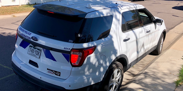 A Denver police car at the scene. 