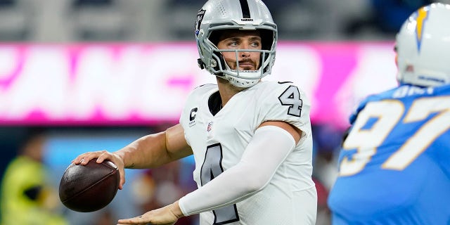 Las Vegas Raiders quarterback Derek Carr throws a pass during the first half of an NFL football game against the Los Angeles Chargers, Monday, Oct. 4, 2021, in Inglewood, Calif.