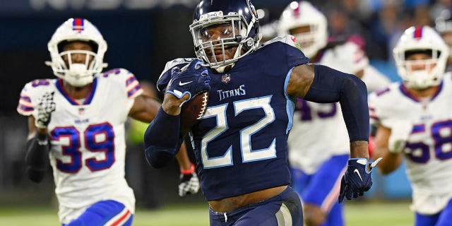 Tennessee Titans running back Derrick Henry (22) runs 76 yards for a touchdown against the Buffalo Bills in the first half of an NFL football game Monday, Oct. 18, 2021, in Nashville, Tenn.