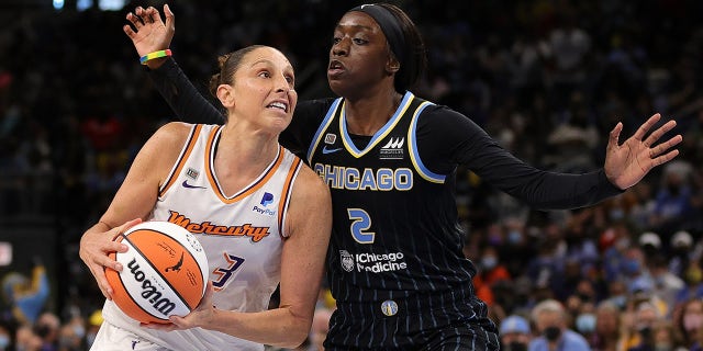 Diana Taurasi (3) of the Phoenix Mercury drives to the basket against Kahleah Copper (2) of the Chicago Sky during the first half of Game 4 of the WNBA Finals at Wintrust Arena on Oct. 17, 2021 in Chicago, Ill.