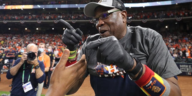 Manager Dusty Baker #12 of the Houston Astros celebrates after defeating the Boston Red Sox 5-0 in Game Six of the American League Championship Series to advance to the World Series at Minute Maid Park on Oct. 22, 2021 in Houston, Texas.
